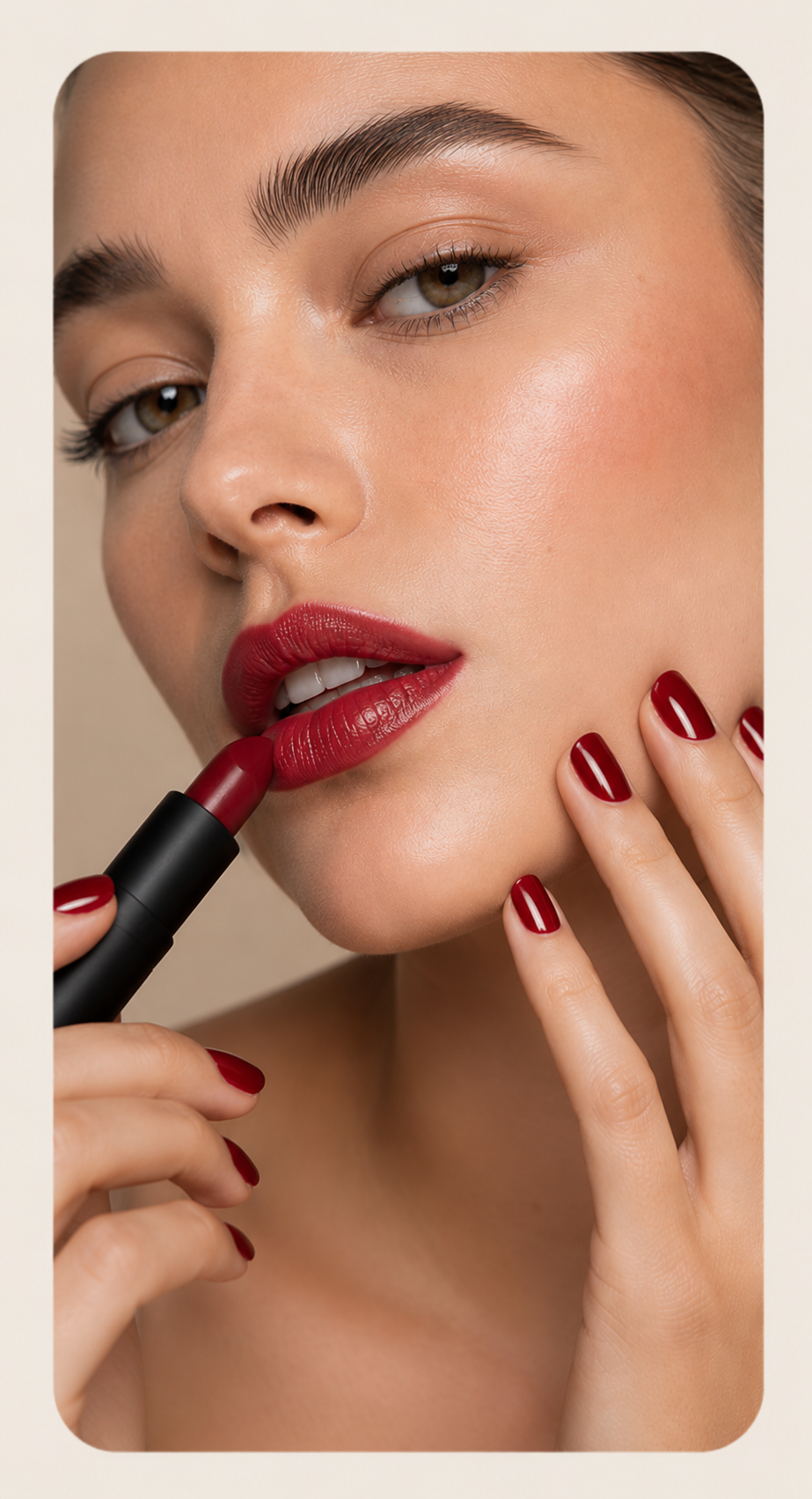Model wearing cherry-red lipstick and matching nail polish representing premium decorative cosmetics.